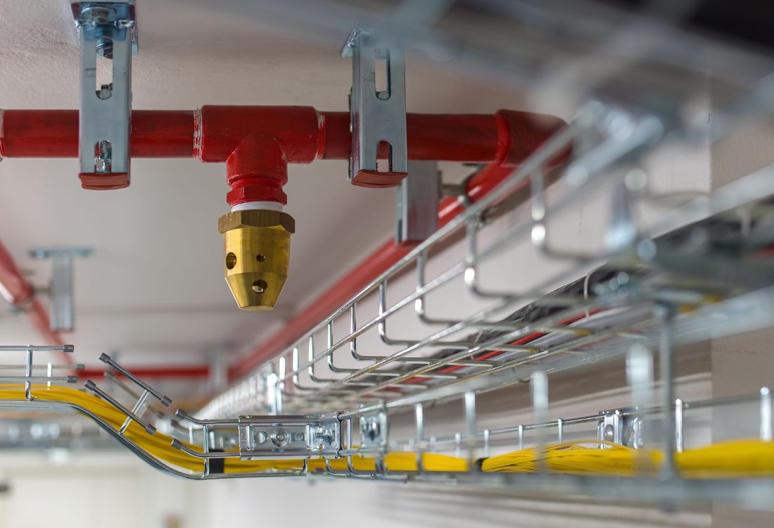 A fire suppression system in a substation displaying its multiple fire safety benefits. 